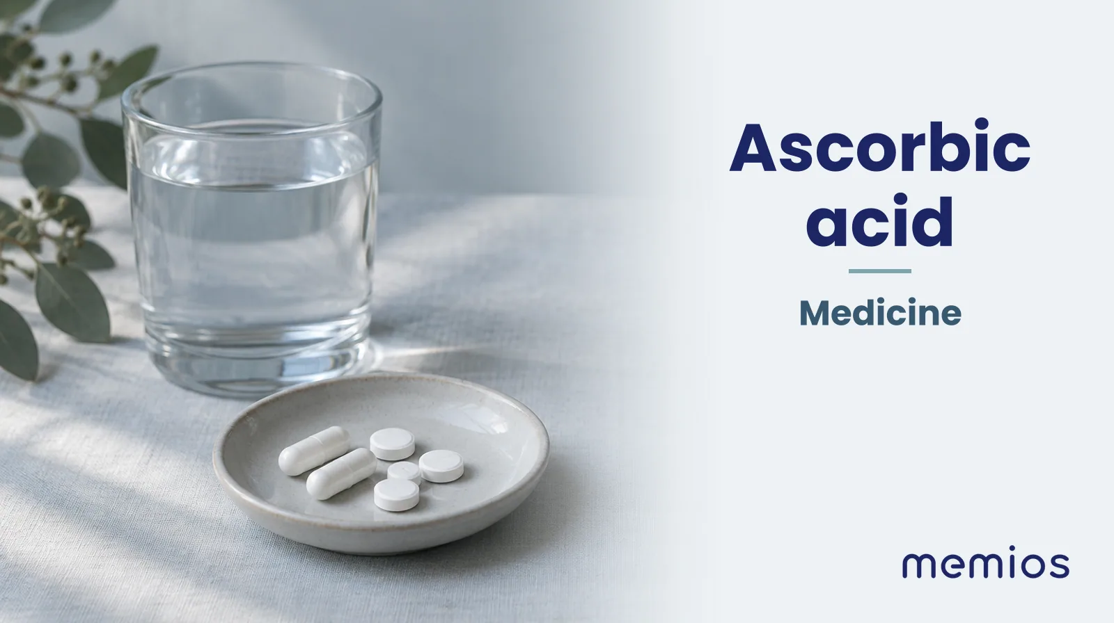 Photograph for Ascorbic acid: plain unmarked tablets in a dish beside a glass of water on pale linen.