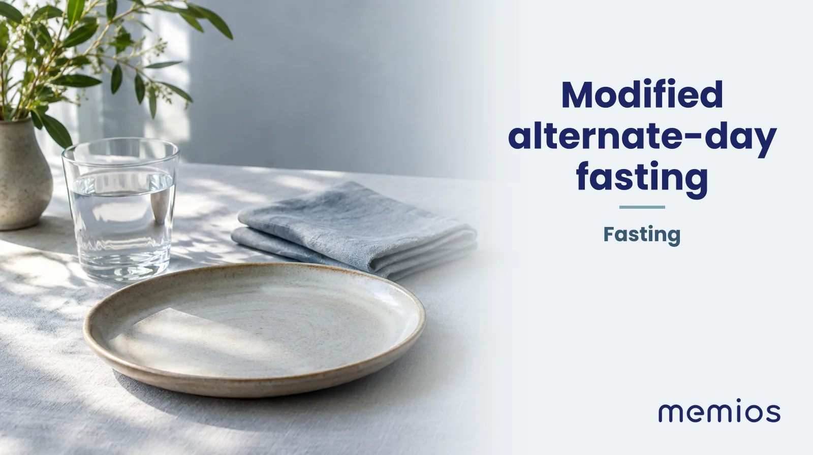 Photograph for Modified alternate-day fasting: a calm table with an empty plate and a glass of water in morning light.